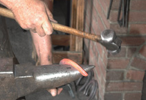 Forging a horseshoe  from bar stock